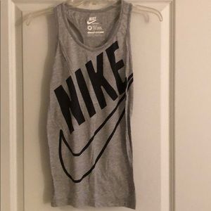 NIKE sportswear. Grey with black lettering. Medium